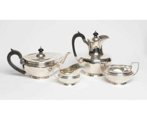 A FOUR PIECE SILVER TEA AND COFFEE SERVICE, maker Manoah Rhodes, Sheffield 1921 and 1923 (teapot), of flared rounded octagona