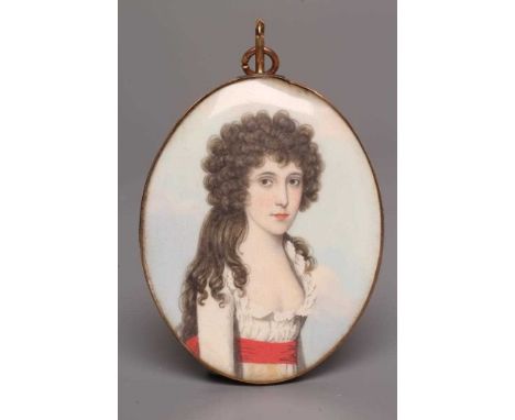 ENGLISH SCHOOL (Late 18th century) A Lady, wearing a white décolleté dress with red sash, oval miniature on ivory with hair p