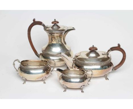A FOUR PIECE SILVER TEA SERVICE, maker Payton, Pepper &amp; Sons Ltd., Sheffield 1970, of rounded oblong baluster form raised