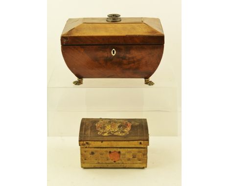 AN EARLY 19TH CENTURY TEA CADDY of sarcophagus shape, the lid with ring handle, fitted with two inner lidded compartments, ra