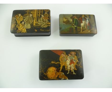 A 19TH CENTURY EUROPEAN SNUFF BOX decorated with a coastal scene and figures, 9cm wide, together with TWO GILDED JAPANESE PAP
