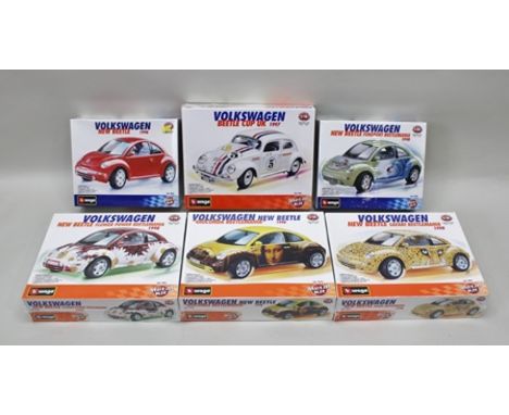 SIX BURAGO METAL KIT MODELS VW New Beetle and VW Beetle Cup UK and other examples, all 1:18 and 1:24 scale, in original seale