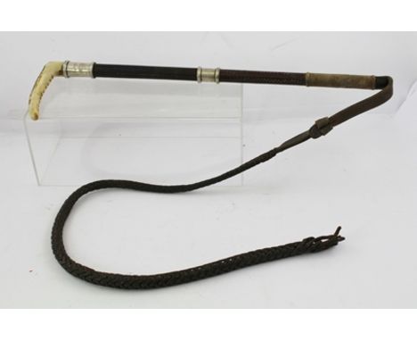 A "SWAINE" SILVER MOUNTED HUNTING CROP with antler handle, engraved "H de M" beneath a Baronets crown 