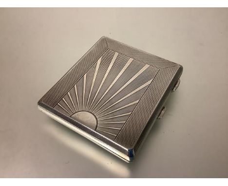 A George V silver cigarette case in the Art Deco taste, Herbert Bushell &amp; Son, Birmingham 1931, of rectangular form, the 