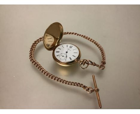 A Waltham 14k gold keyless wind small full hunter pocket watch, the signed white enamel dial with Roman numerals and subsidia