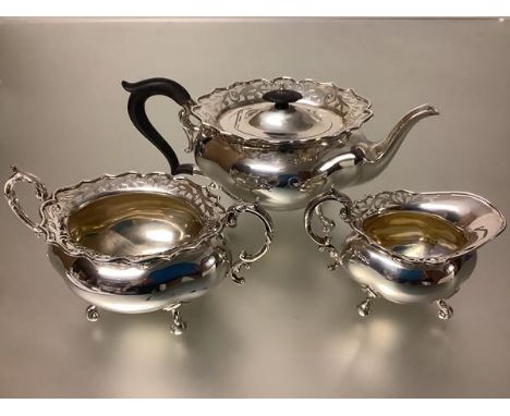 A late Victorian three piece silver tea service, James Deakin &amp; Sons, Sheffield, possibly 1898 (date mark indistinct), ea