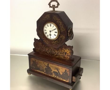 An early 19th century brass-inlaid rosewood mantel clock, the 4" white enamel dial with Roman numerals within an octagonal fr