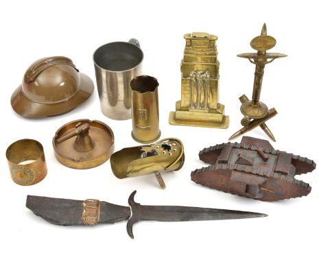 6 items of WWI Trench art: darkwood tank; base of shellcase ashtray with small AA gun; dagger made from large shell fragment,