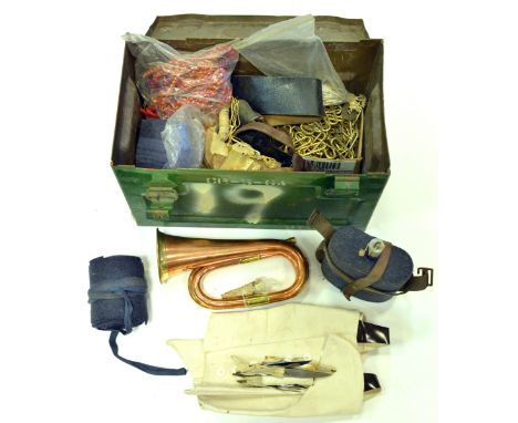 A modern copper and brass bugle, an RAF water bottle with leather harness, a pair of RAF puttees, a pair of button up white c