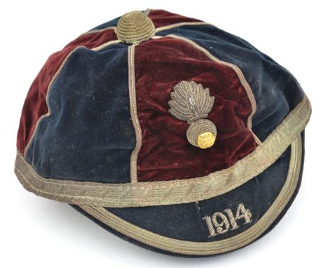 A 1914 regimental cricket cap of The R. Fusiliers, of dark blue and crimson velvet, with silver lace and braid trim, bullion 