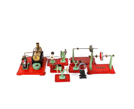 2 spirit fired Stationary Engines by Mamod and 10 plant accessories. A single cylinder engine (SP2) in its box. Another unbox