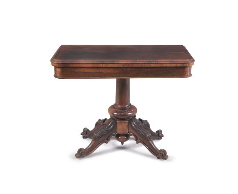 A VICTORIAN ROSEWOOD FOLDING TOP CARD TABLE, of rectangular form, with moulded rim, the base lined interior on a turned centr