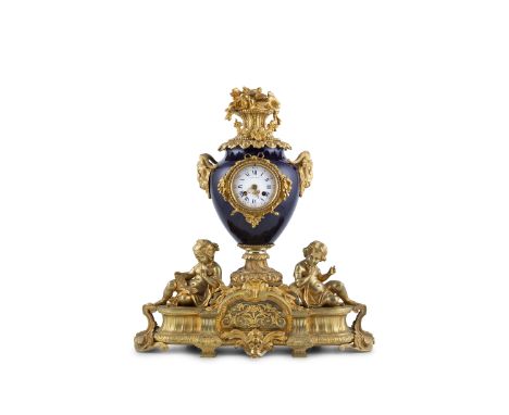 A 19TH CENTURY FRENCH SEVRES STYLE PORCELAIN AND ORMOLU MOUNTED MANTLE CLOCK, with a basket of flowers, the vase shaped deep 