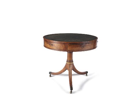 A GEORGE III MAHOGANY CIRCULAR RENT TABLE, the top with inset green leather within a narrow rim, above six hinged drawers wit