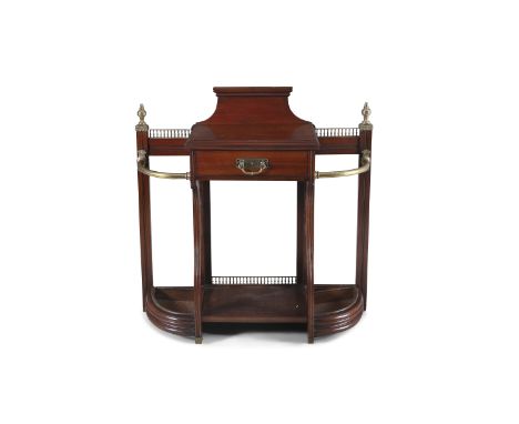 A VICTORIAN MAHOGANY BRASS MOUNTED STICK STAND, attributed to James Shoolbred &amp; Co., the single frieze drawer stamped wit