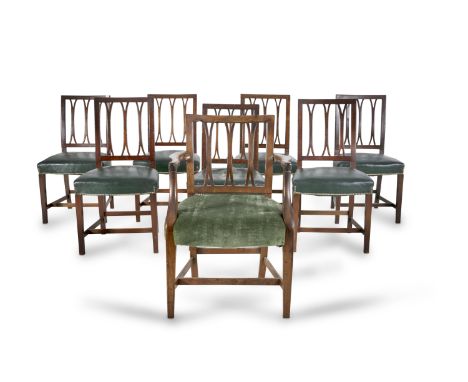 A SET OF EIGHT 19TH CENTURY MAHOGANY FRAMED STICK BACK DINING CHAIRS, with padded seats covered in green hide and raised on s