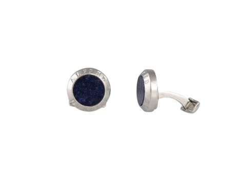 A GROUP OF THREE PAIRS OF CUFFLINKS, comprising:- A pair of silver cufflinks by Alfred Dunhill;- A pair of ruby and diamond c