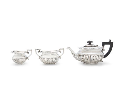A THREE PIECE GEORGIAN REVIVAL TEA SERVICE, Birmingham, c.1907, mark of W G Keight &amp; Co., comprising a teapot, two-handle