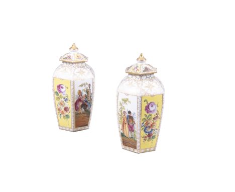 A PAIR OF 19TH CENTURY DRESDEN VASES AND COVERS, of tapered in hexagonal form, each with domed top and pointed finial, each p