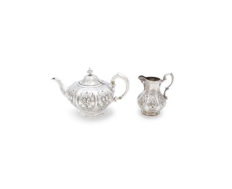 A VICTORIAN SILVER TEAPOT AND CREAM JUG SET, London c.1860, mark of Edward Ker Reid, the teapot of squashed baluster form, th