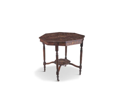 AN EDWARDIAN ROSEWOOD OCTAGONAL CENTRE TABLE, inlaid with a central star shaped medallion within boxwood stringing, on turned