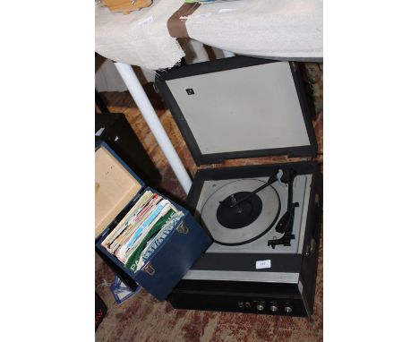 A vintage Bush turntable and selection of 7inch singles (no in-house postage) 
