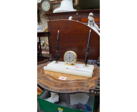 A vintage Angelus onyx timepiece deskstand, 24.5cm wide.  Condition Report: Overall condition is good, both pens and letter o