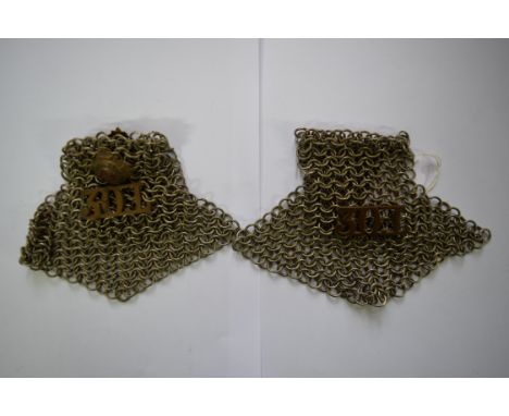 A pair of chain mail epaulettes, from the 30th Lancers. 