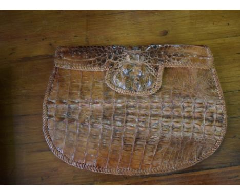 A vintage crocodile handbag. 