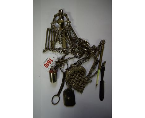 A Georgian bright cut chatelaine, with attached bucket pin cushion; aide memoir; folding scissors; coin purse; pencil holder;