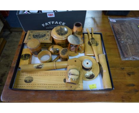 A large collection of Mauchlinware, to include: a cribbage board; a card case and cover; glove stretcher; novelty bell tape m