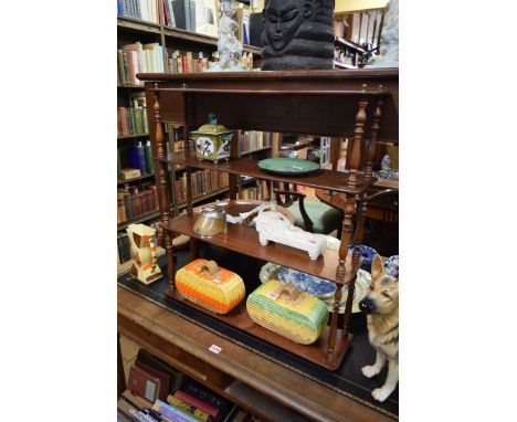 An antique mahogany four tier open hanging wall shelf, 63.5cm wide. 