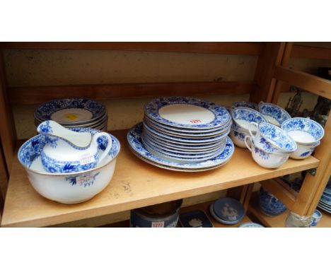 A late Victorian Doulton Burslem porcelain part tea service, printed with a blue and white design. 