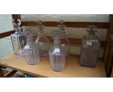 Two pairs of antique glass decanters and stoppers; together with another 19th century cut glass decanter and stopper; and ano