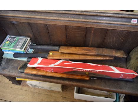 Four vintage cricket bats, to include a Denis Compton example; a Garfield Sobers example; together with five Denis Compton bo