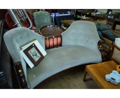 A Victorian rosewood framed and button upholstered settee, 153cm wide. 