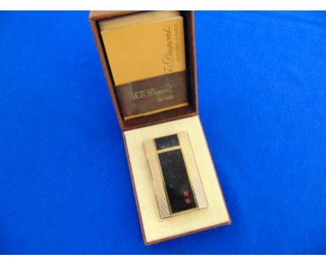 A DuPont lighter, boxed, Chinese inscription