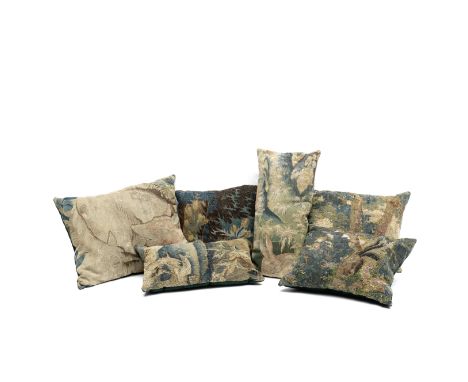 A collection of six tapestry cushionsAdapted from 17th and 18th century verdure tapestry fragments, With velvet backs,  The l