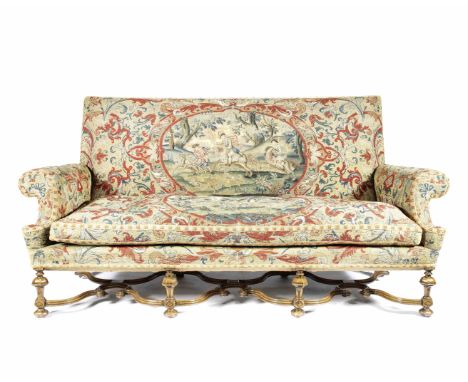 A Carolean style walnut and needlework upholstered sofaThe upholstery, 18th century, the frame, circa 1900with verdure tapest