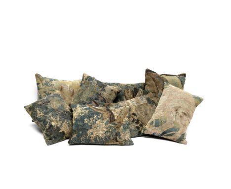 A collection of eight tapestry cushionsAdapted from 17th and 18th century verdure tapestry fragments with woollen cloth backs