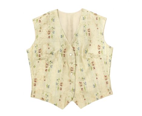A floral cream silk waistcoatThe silk late 18th century, possibly EnglishBrocaded with flower sprigs, with five mother of pea