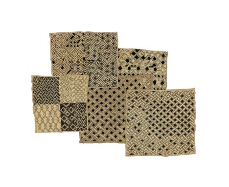 A pair of Kuba textilesZaire, mid-20th centuryHaving a raffia pile in shades of brown and cream, designed with a lattice patt