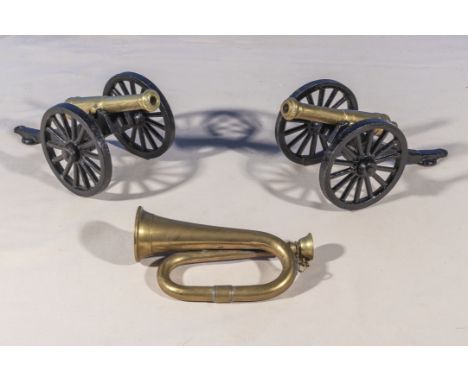 Two small cannons, 20cm long and a miniature bugle 14cm