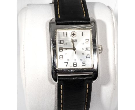 Swiss army watch in stainless steel tank casing model Victorinox./24778/050806040. Water resistant on black leather strap. In