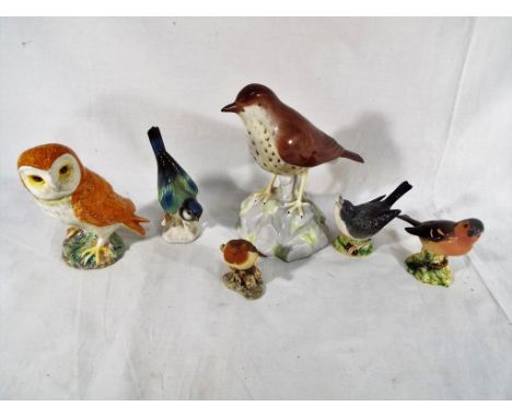 6 ceramic figurines all depicting birds to include, Spode, Beswick # 2026, Beswick # 2106, Wedgwood, Beswick # 166 and a blue
