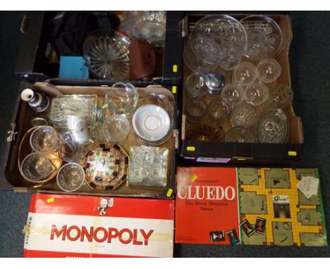 A good mixed lot to include a quantity of camera equipment to include, a vintage Cludo and Monopoly board games a vintage Cor