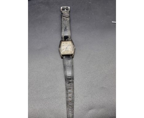 An Art Deco Rotary silver tonneau manual wind wristwatch,&nbsp;31mm, on black leather strap. 