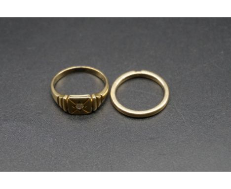 A yellow metal diamond ring, stamped 18 set, size M 1/2; together with a yellow metal ring stamped 750, size K. 