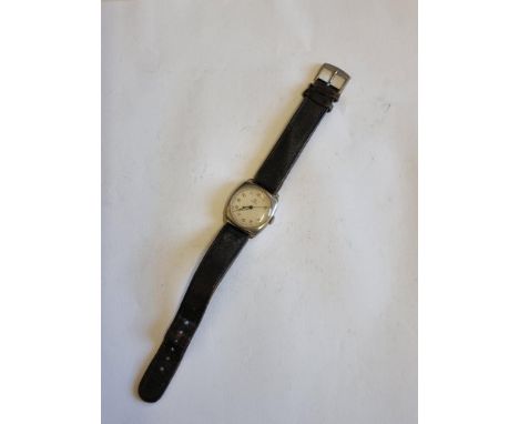 A circa 1934 Omega stainless steel manual wind wristwatch,&nbsp;28mm, Serial No. 8591457, on a leather strap. 