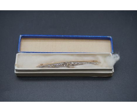 A Victorian or Edwardian yellow metal and platinum diamond brooch, set twenty-five old cut and rose cut diamonds of approx 1c